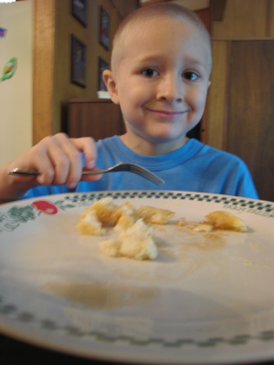 Josiah eating pancakes